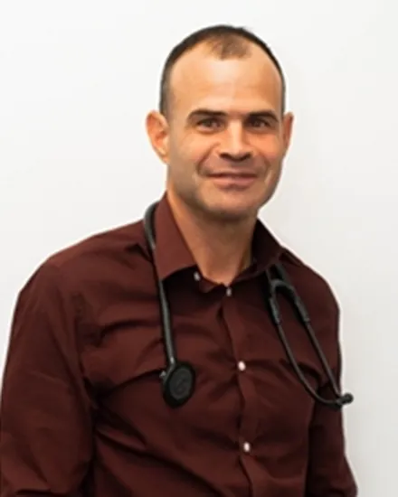 Portrait of Jason Brancato, PA, wearing a stethoscope