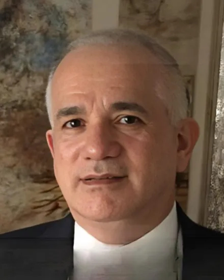 Portrait of Ricardo Zaldivar, PA, wearing glasses