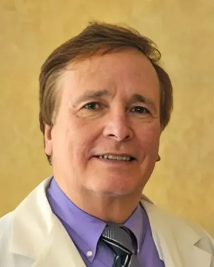 Portrait of Dr. Stuart Horowitz, MD, in a white coat
